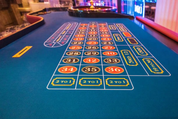 Live casino table with dealer and players